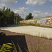 Near the S-Bahn-station Nordbahnhof on the former area of the berlin ball a park has been developed, that includes elements of the historic trackage as well as beachvolleyball-fields partially bounded by fragments of the former wall.